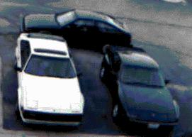 back of 3 cars